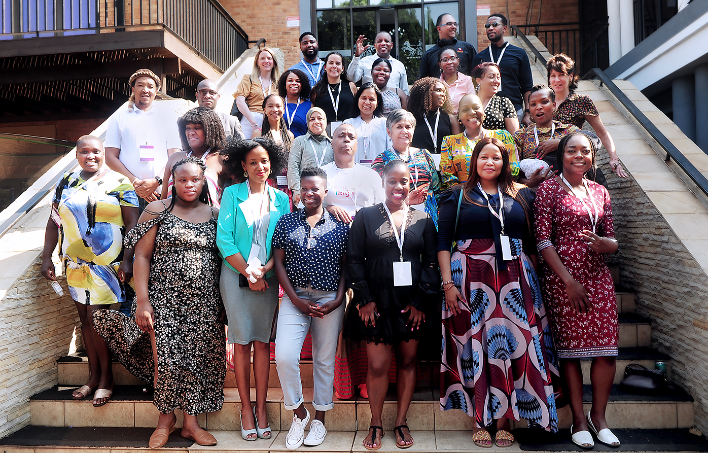 Several individuals from the south africa stakeholders consultation grouped on stairs